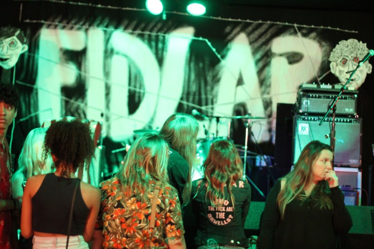 Fans await FIDLAR's performance at the High Dive. The four-piece punk rock band visited Gainesville for the first time on Saturday.